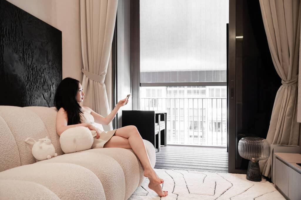 TikTok Personality Deborah Kwek with her ShadeSpace Curtains, ZipBlinds and Invisible Grilles in her singapore condo home